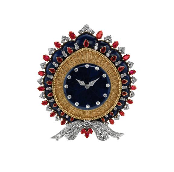 Table Clock (l968) gold and Platinum with Lapiz Lazuli and diamond and rubies.
